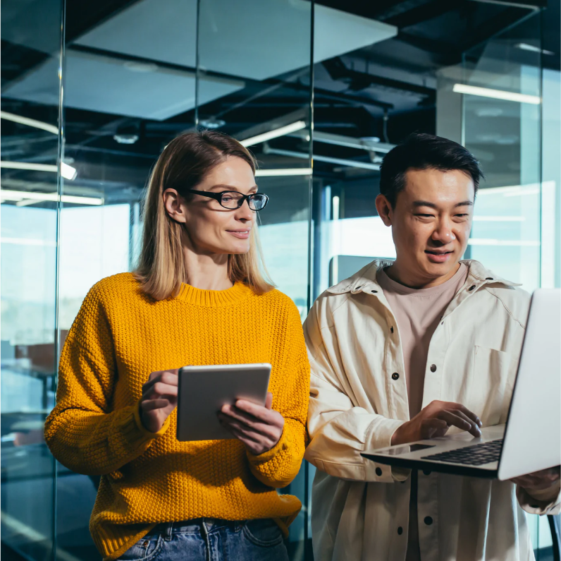 Man & Women with Ipad & Laptop